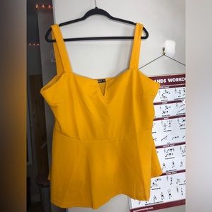 Yellow peplum top